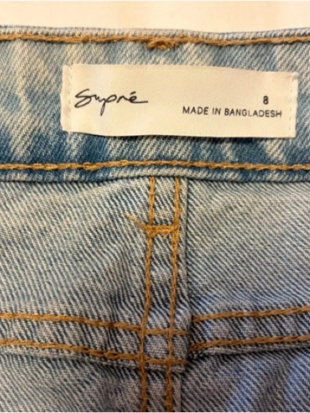 SUPRE Light Wash Denim Mini Skirt